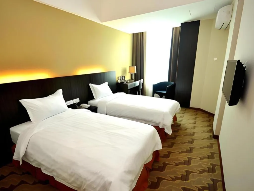 Bed in Eminent Hotel