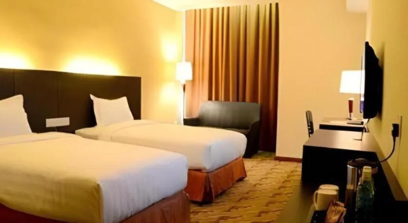 Bed in Eminent Hotel