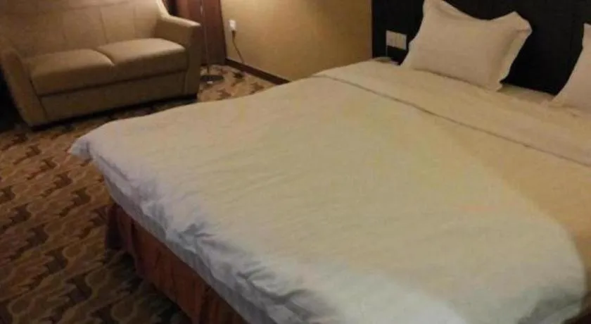Bed in Eminent Hotel