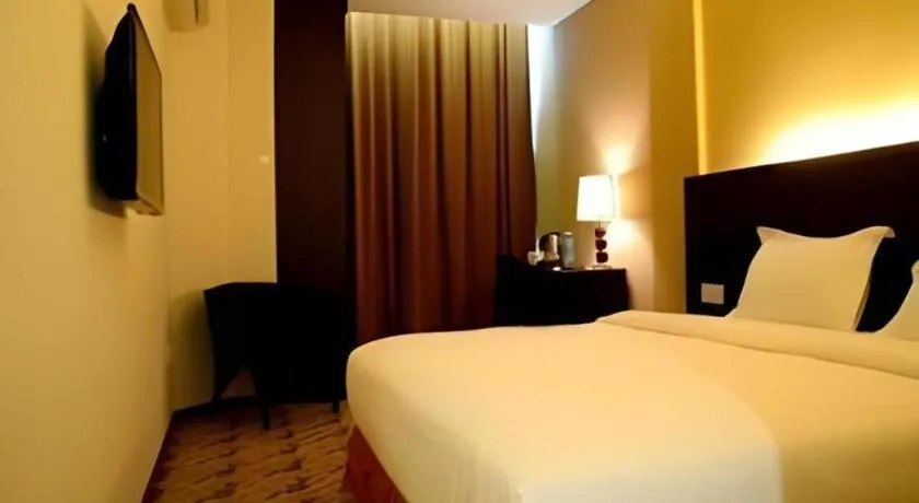 Bed in Eminent Hotel