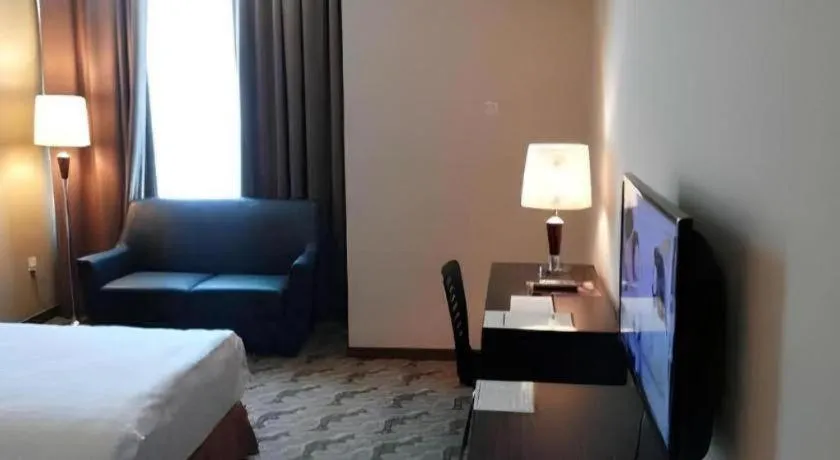 Bed in Eminent Hotel