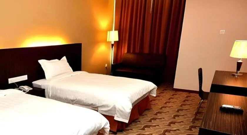 Bed in Eminent Hotel
