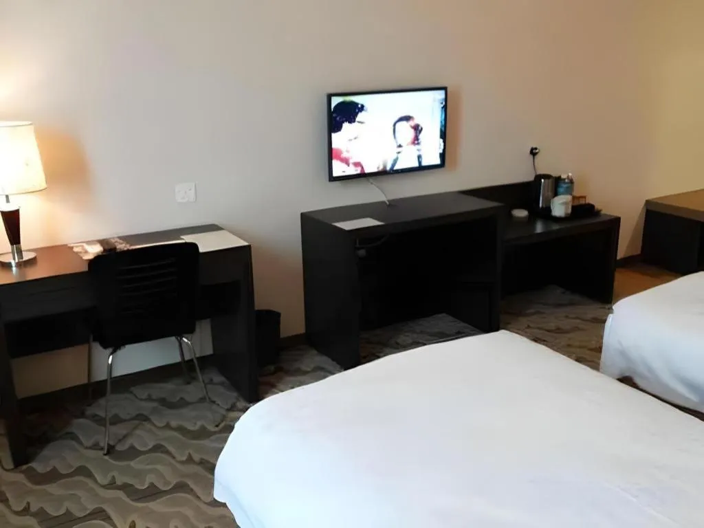 Bed in Eminent Hotel