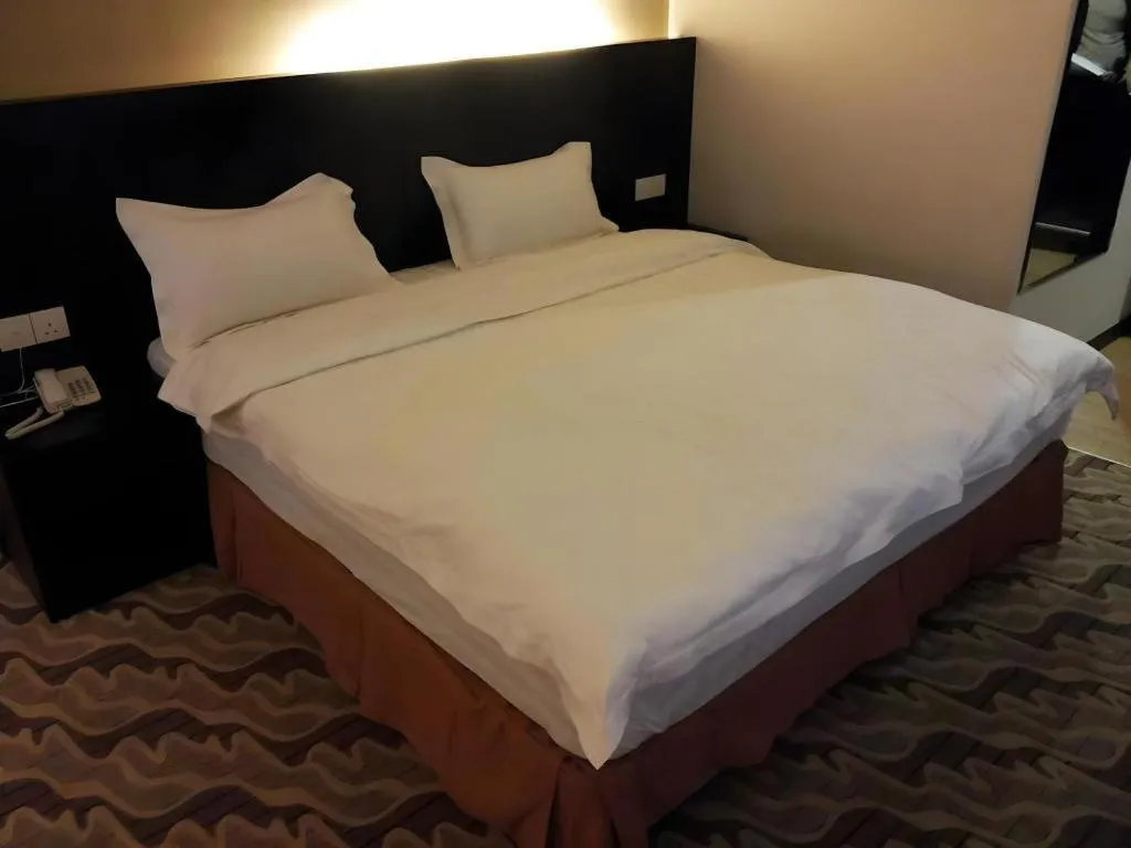 Bed in Eminent Hotel