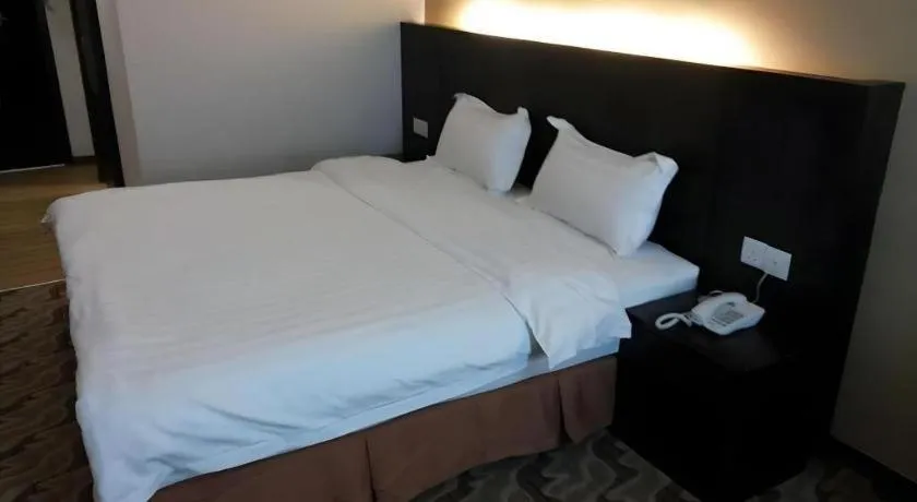 Bed in Eminent Hotel