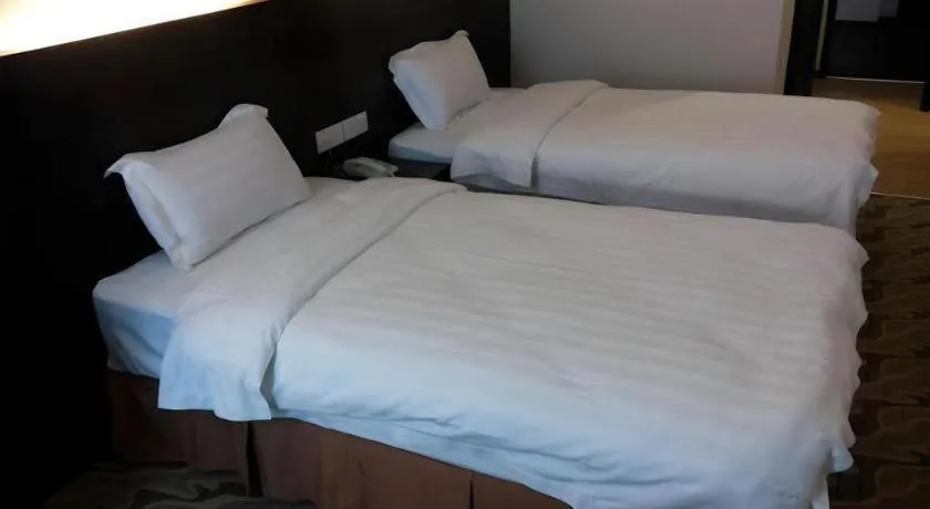 Bed in Eminent Hotel