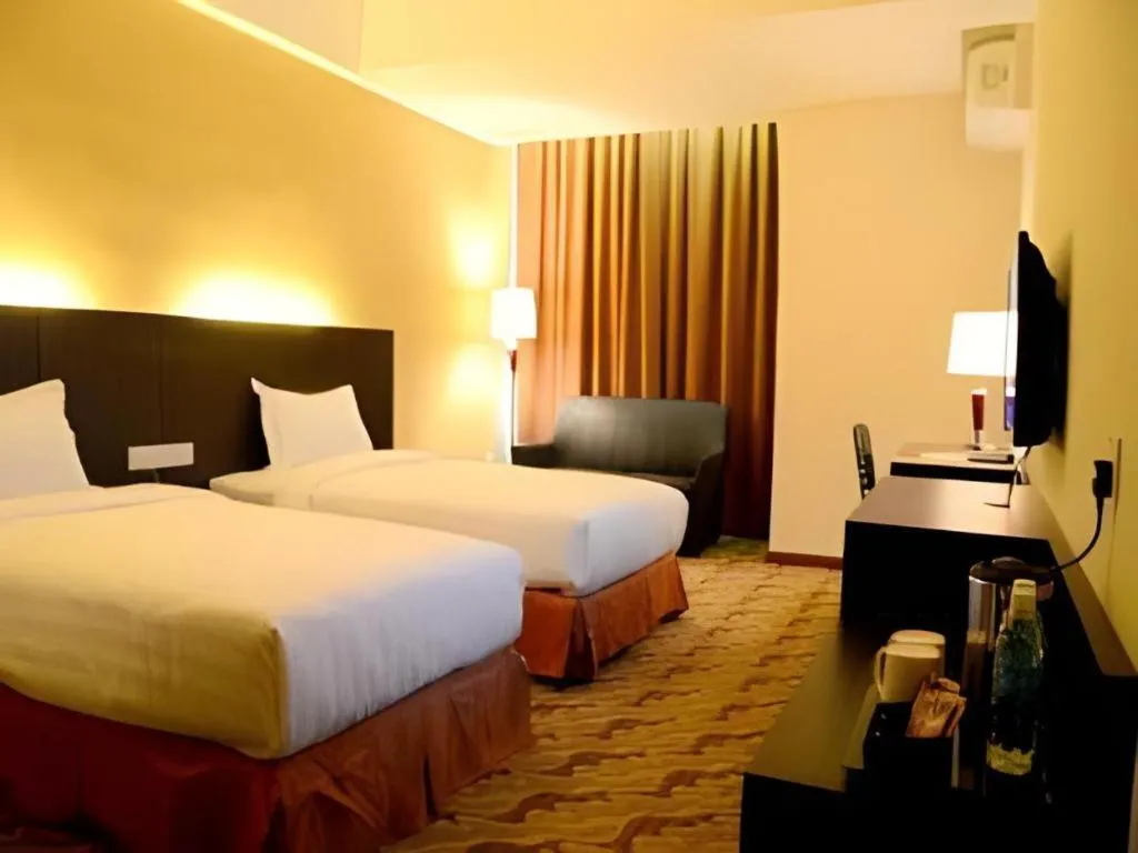 Bed in Eminent Hotel