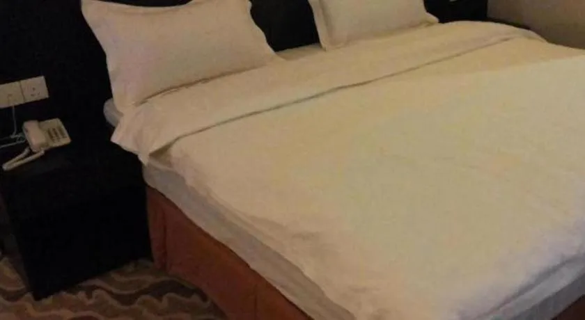 Bed in Eminent Hotel