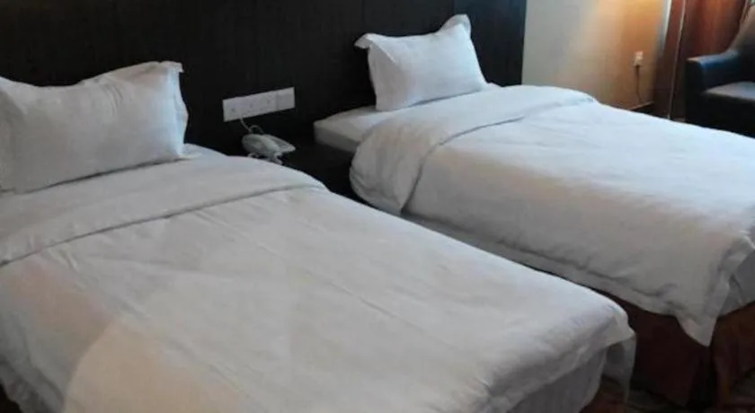 Bed in Eminent Hotel
