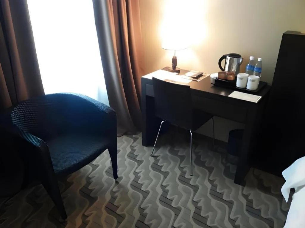 Bed in Eminent Hotel