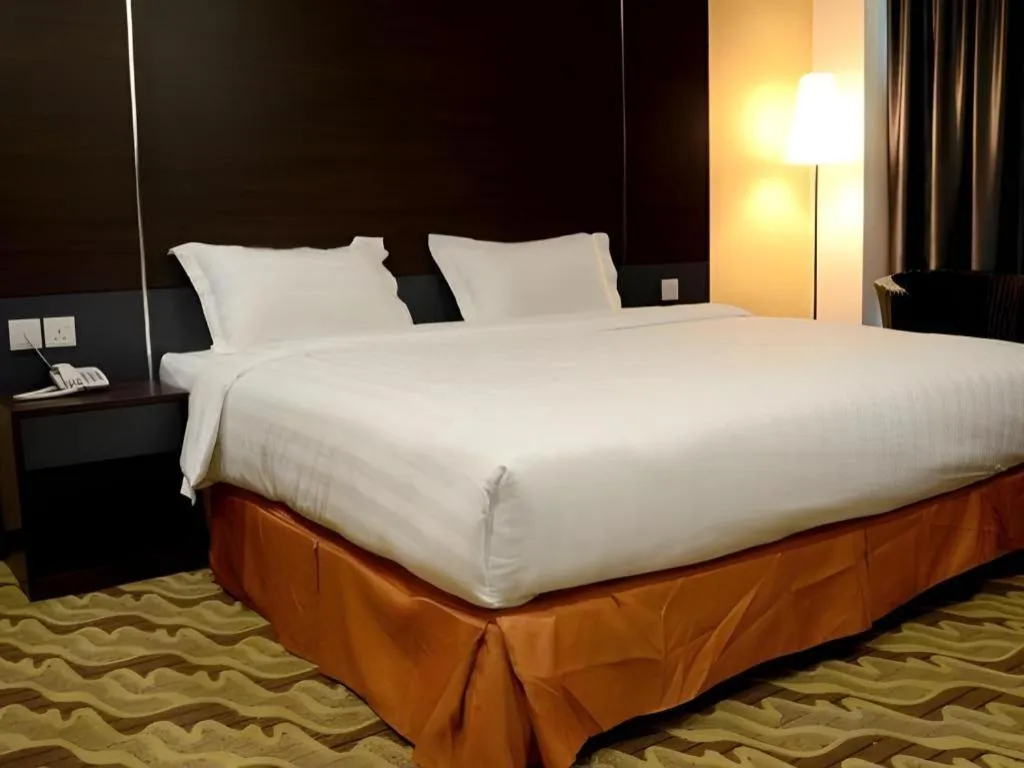 Bed in Eminent Hotel