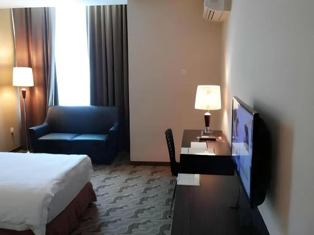 Bed in Eminent Hotel