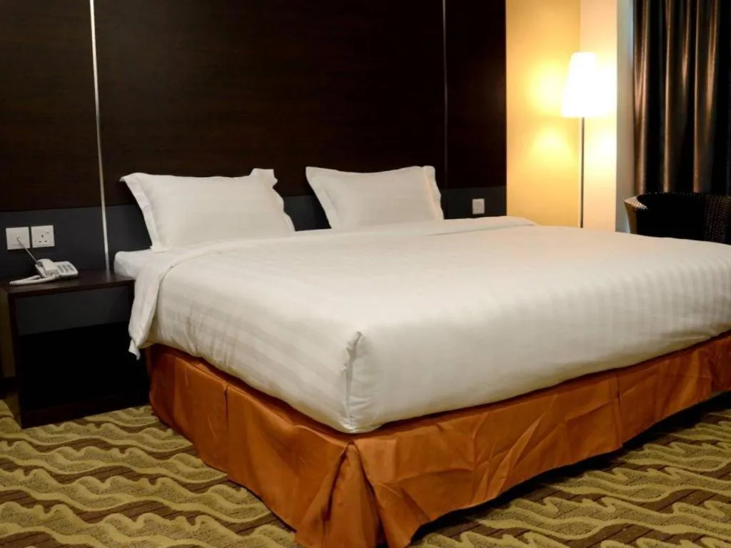 Bed in Eminent Hotel