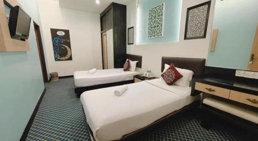 Bed in Hotel El Zahraa