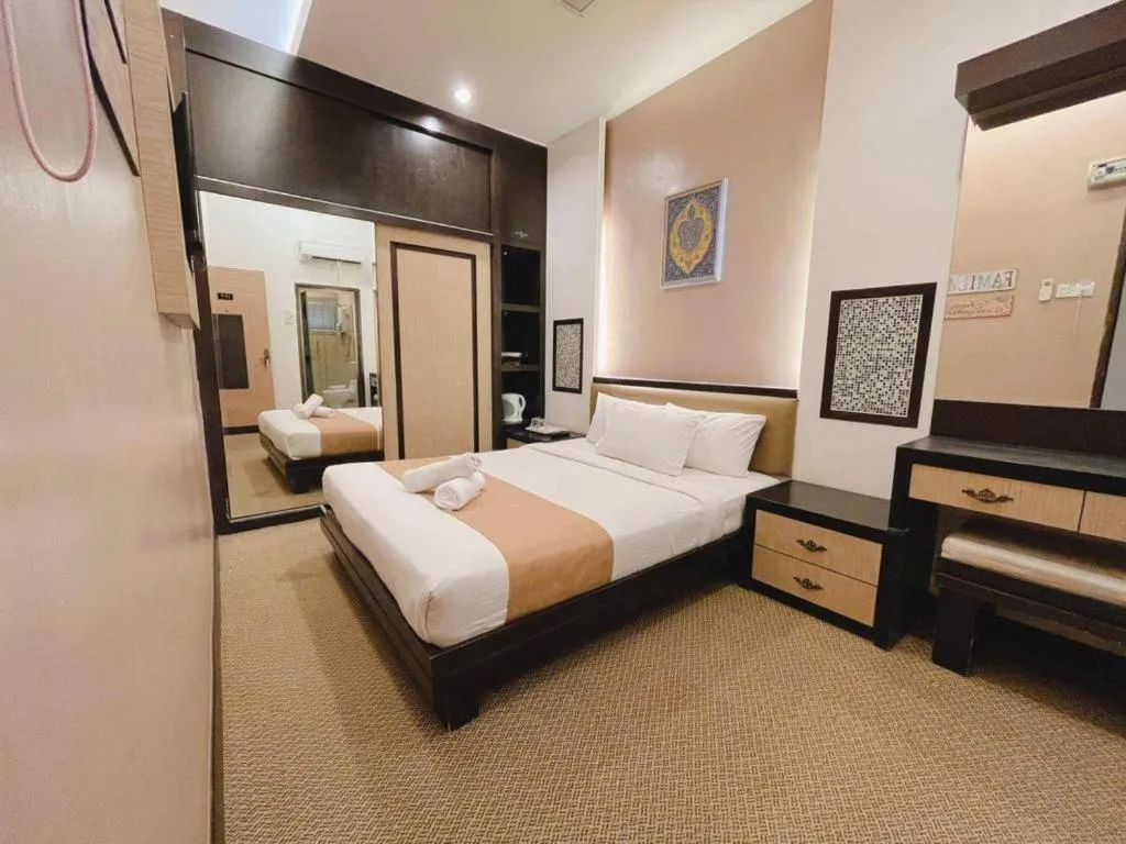 Bed in Hotel El Zahraa