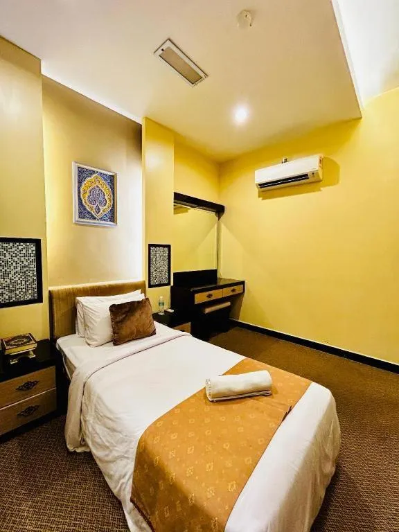 Bed in Hotel El Zahraa