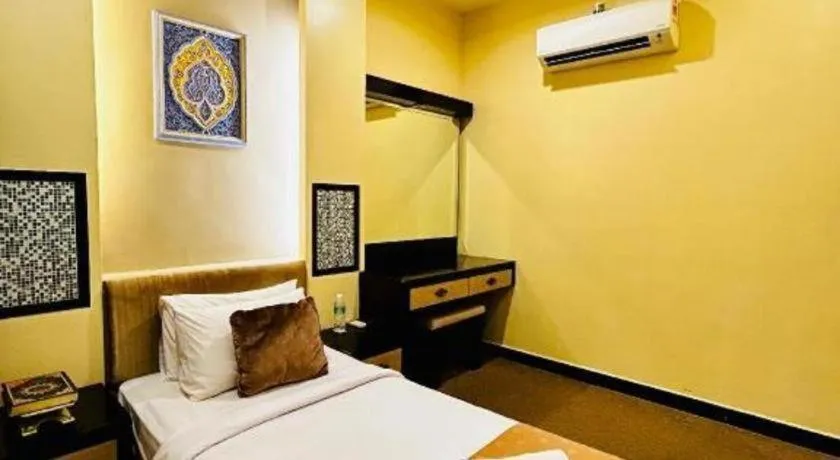 Bed in Hotel El Zahraa