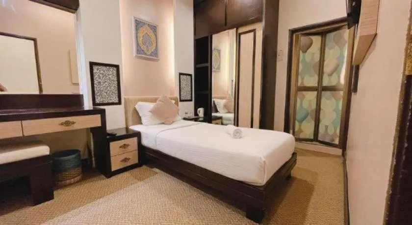 Bed in Hotel El Zahraa