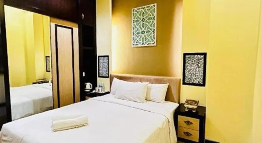 Bed in Hotel El Zahraa