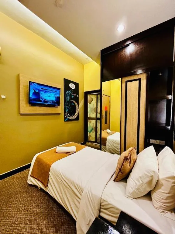 Bed in Hotel El Zahraa