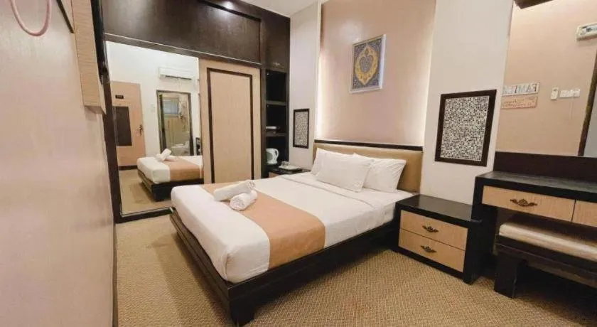 Bed in Hotel El Zahraa