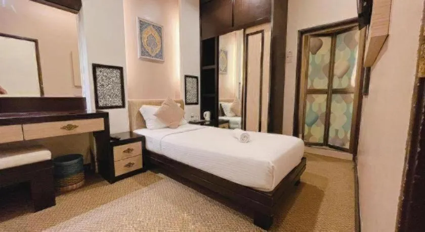 Bed in Hotel El Zahraa