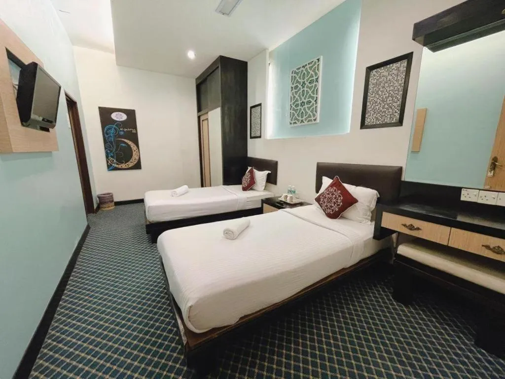 Bed in Hotel El Zahraa