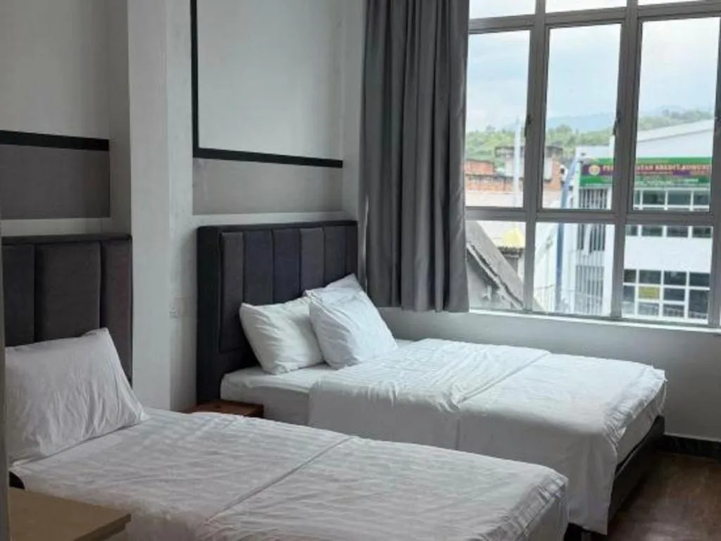 Bed in Hotel Zamburger Bentong