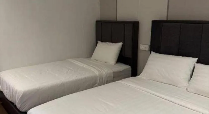 Bed in Hotel Zamburger Bentong