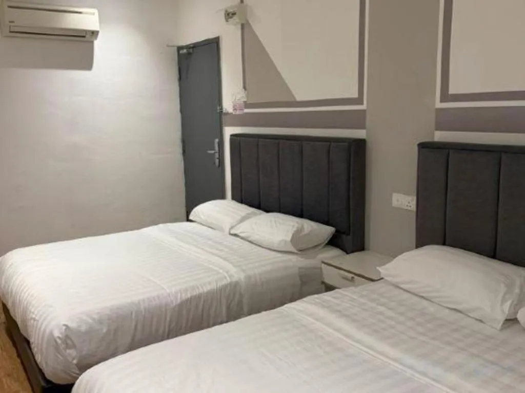 Bed in Hotel Zamburger Bentong