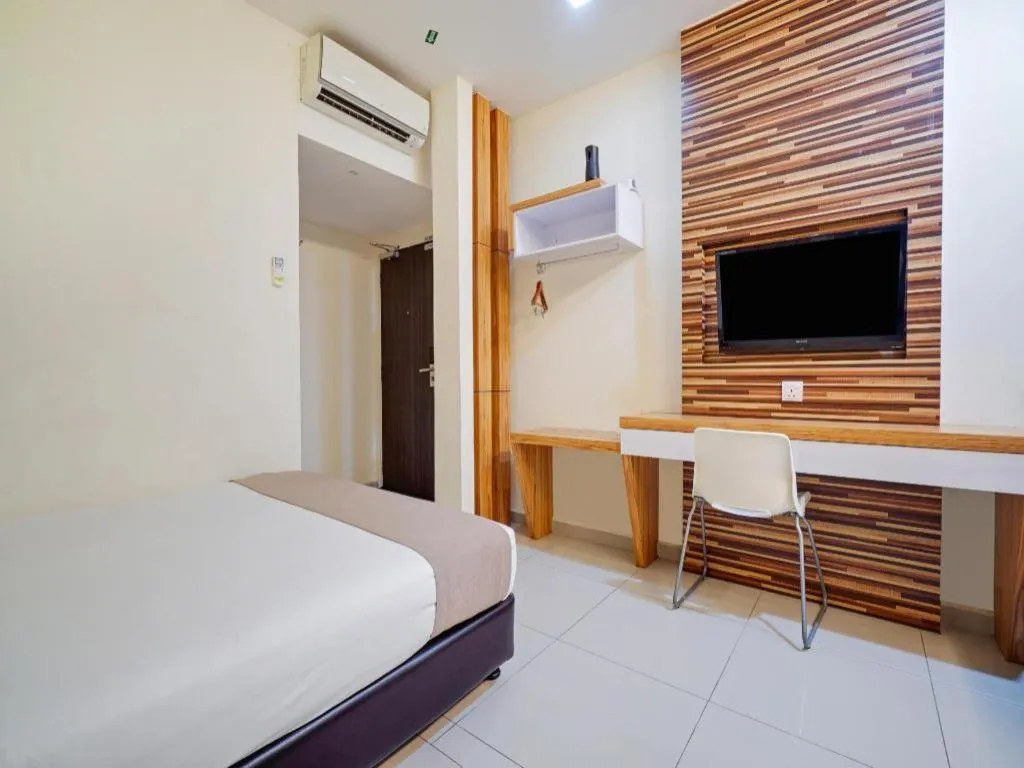 Bed in GM Holiday Hotel Permai Jaya