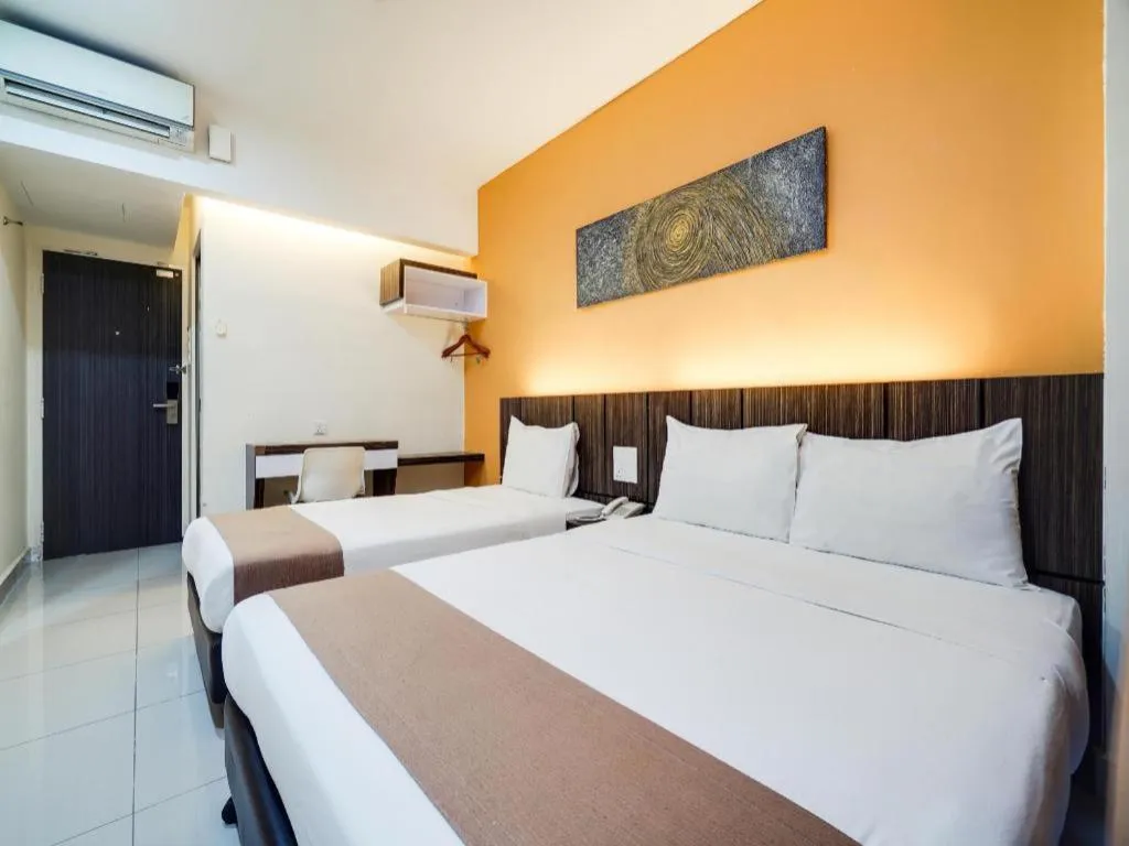 Bed in GM Holiday Hotel Permai Jaya