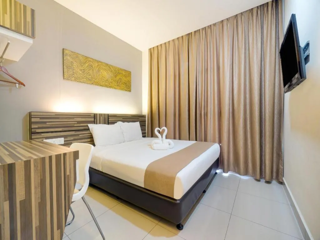 Bed in GM Holiday Hotel Permai Jaya