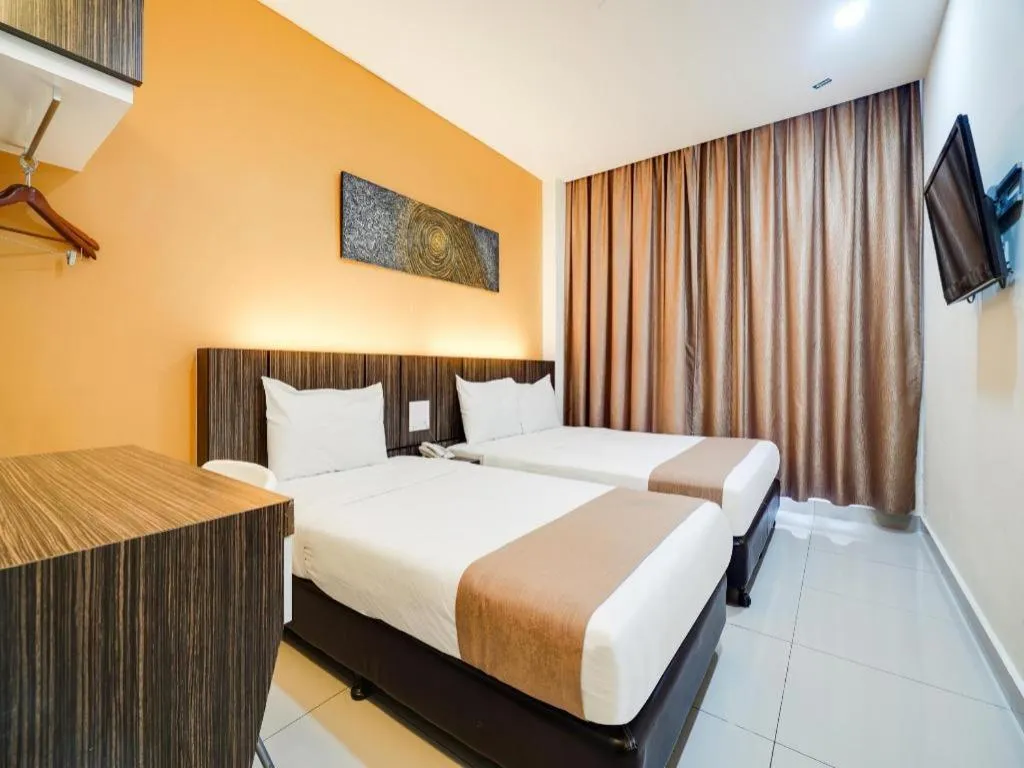 Bed in GM Holiday Hotel Permai Jaya