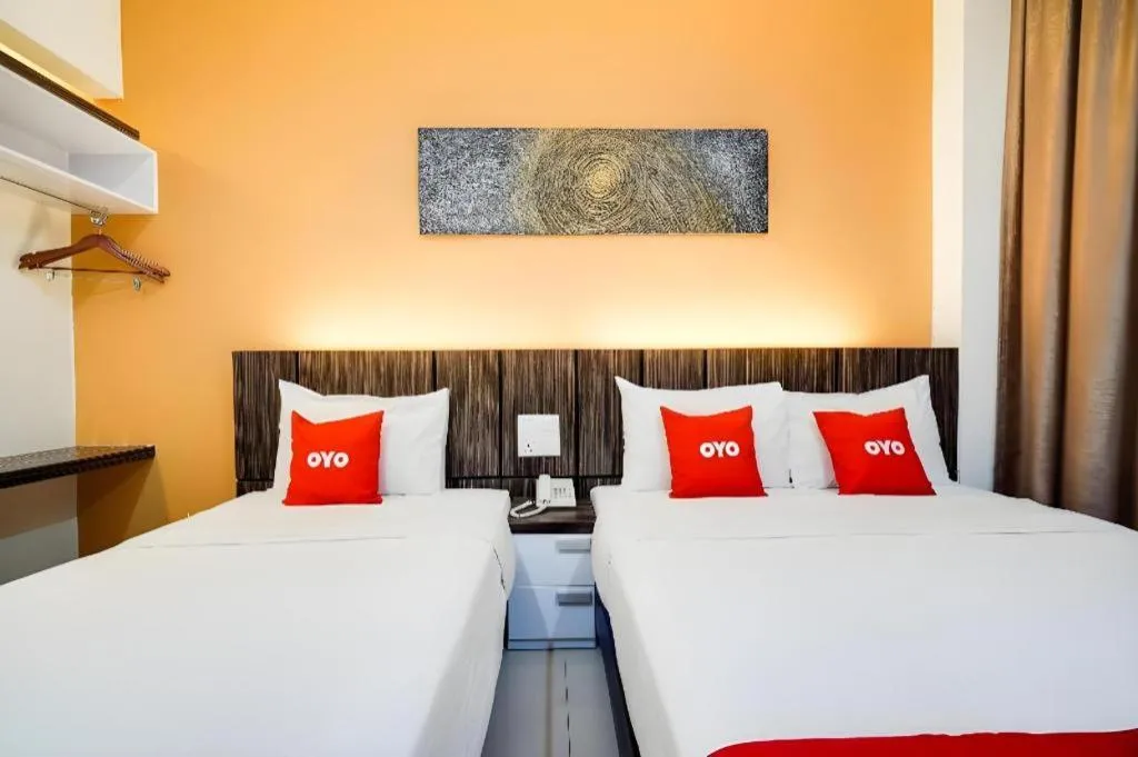 Bed in GM Holiday Hotel Permai Jaya