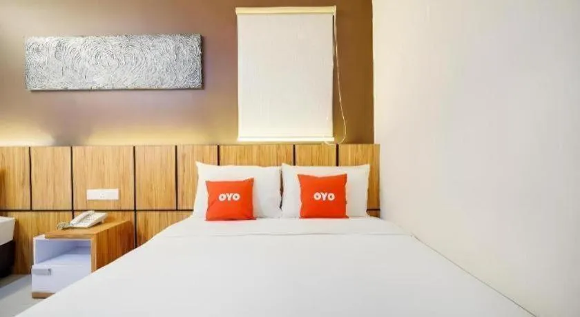 Bed in GM Holiday Hotel Permai Jaya