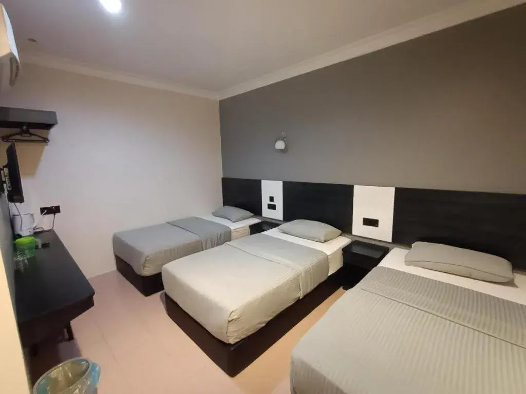 Bed in Sherrinton Hotel Bed in Sherrinton Hotel