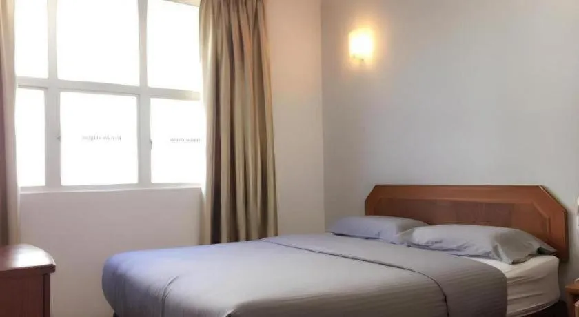 Bed in Sherrinton Hotel