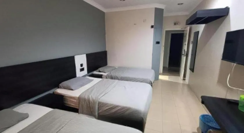 Bed in Sherrinton Hotel