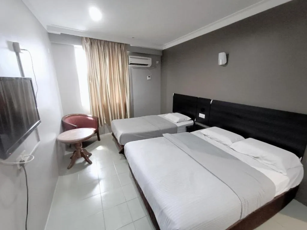 Bed in Sherrinton Hotel