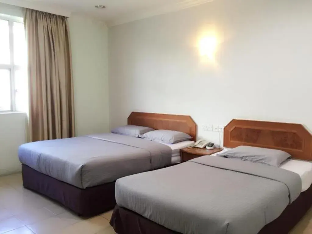 Bed in Sherrinton Hotel Bed in Sherrinton Hotel