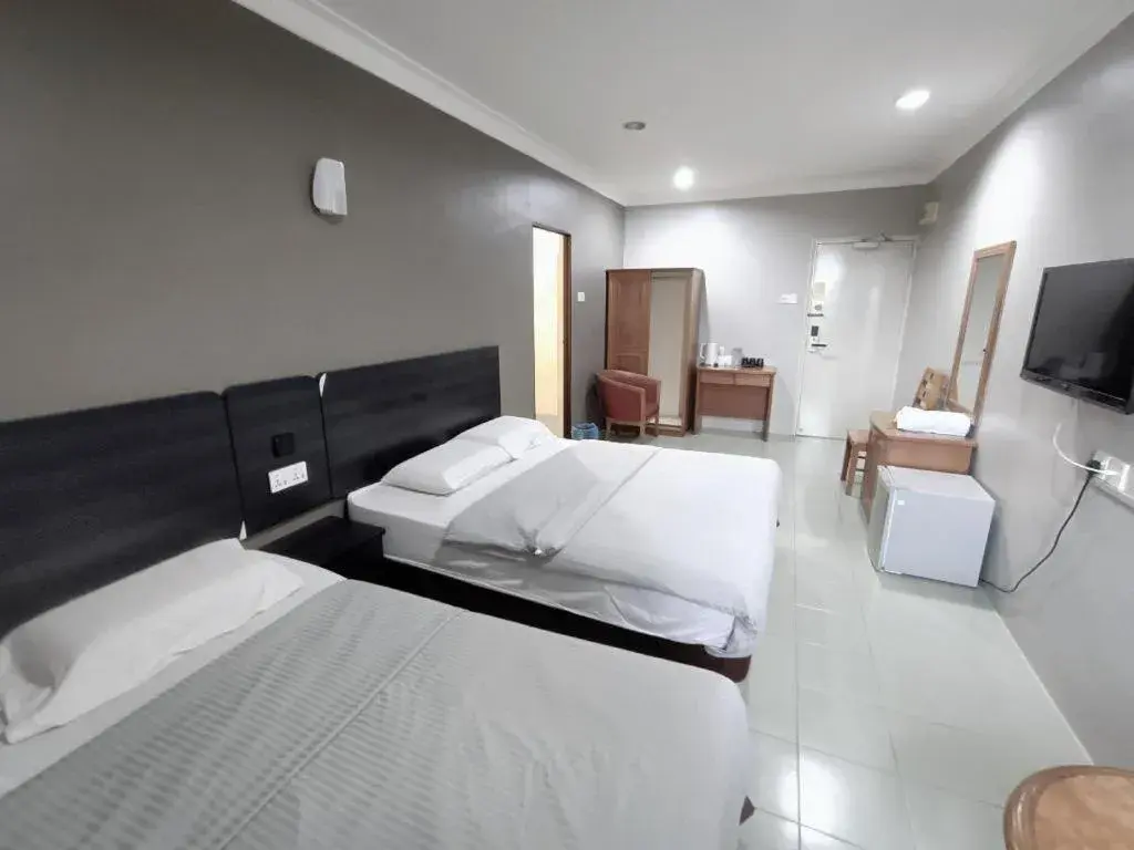 Bed in Sherrinton Hotel Bed in Sherrinton Hotel