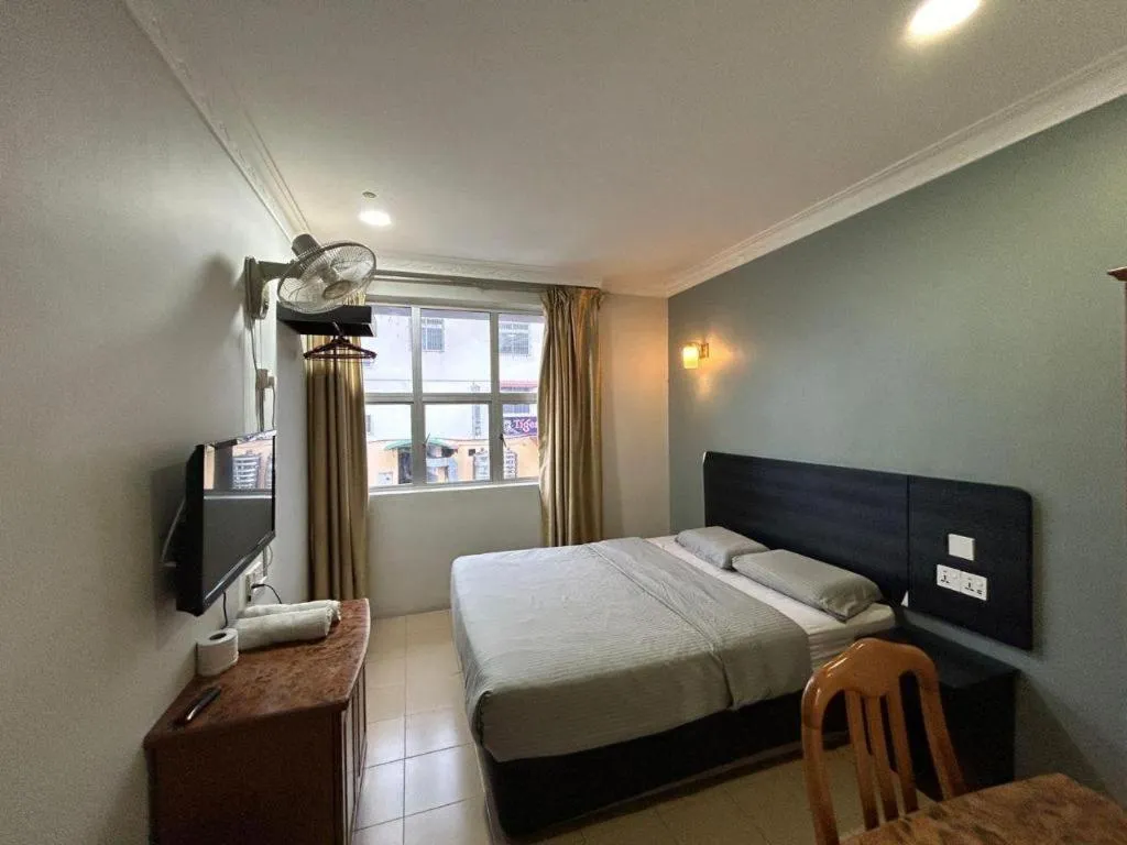 Bed in Sherrinton Hotel