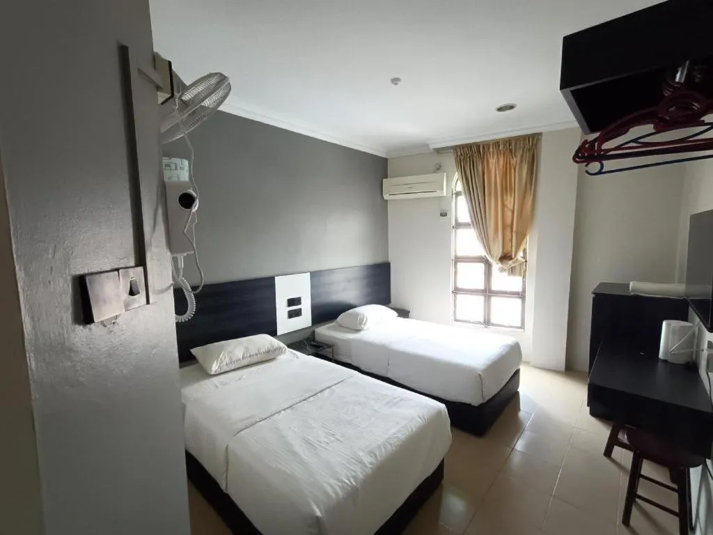 Bed in Sherrinton Hotel