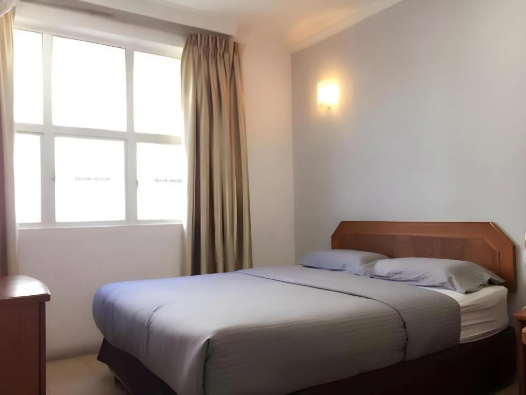 Bed in Sherrinton Hotel