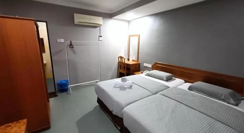 Bed in Sherrinton Hotel