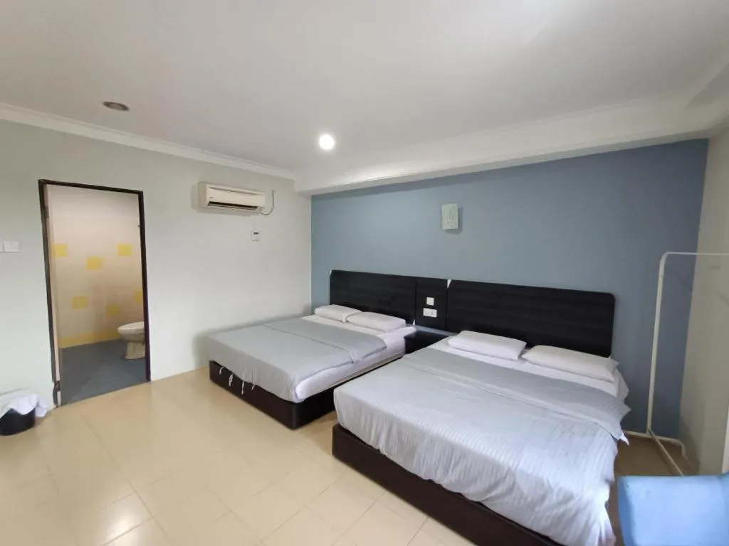 Bed in Sherrinton Hotel