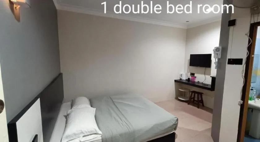 Bed in Sherrinton Hotel