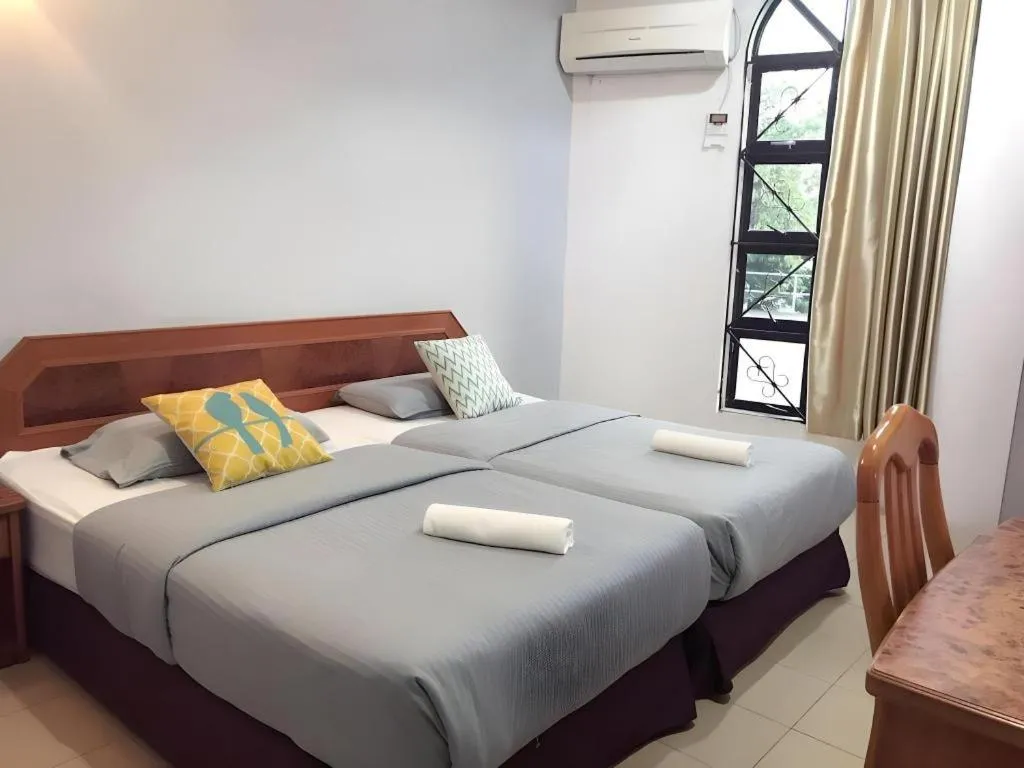 Bed in Sherrinton Hotel