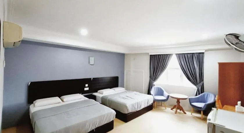 Bed in Sherrinton Hotel